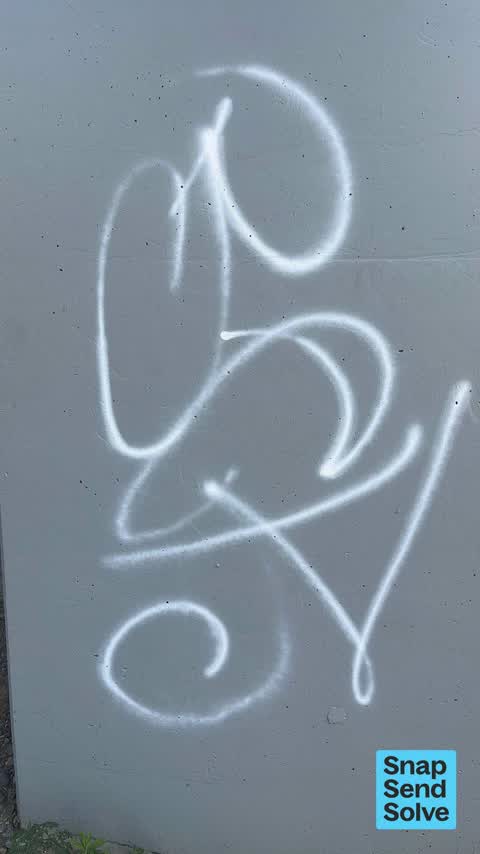 Graffiti on a road, footpath or bridge, a report photo