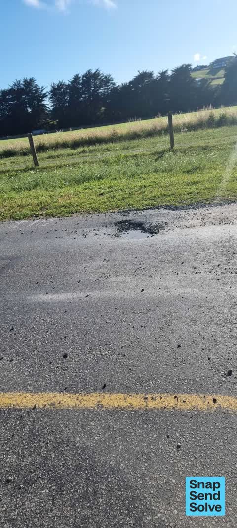 Pothole — a report photo