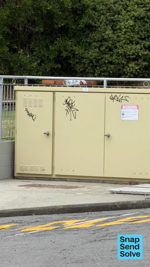Graffiti on a fence, building or structure, a report photo