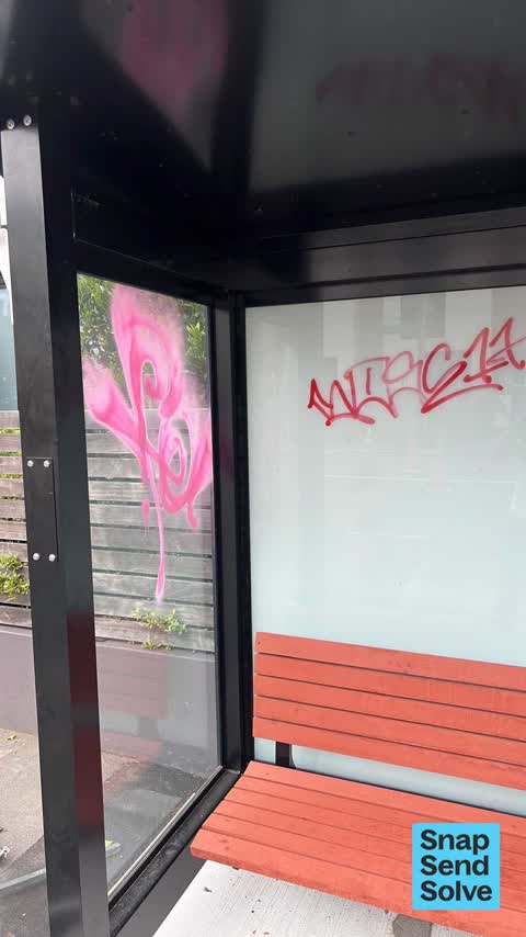 Graffiti on a bus stop or public toilet, a report photo