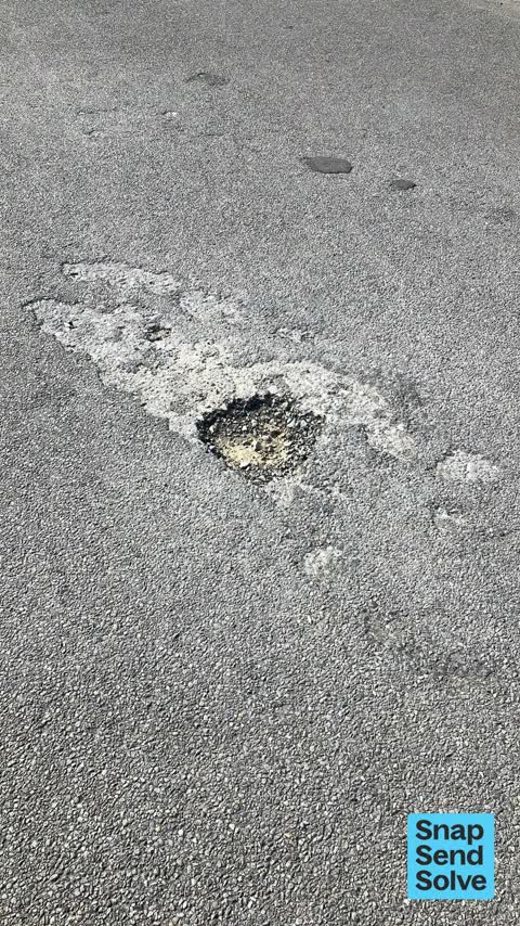 Pothole — a report photo