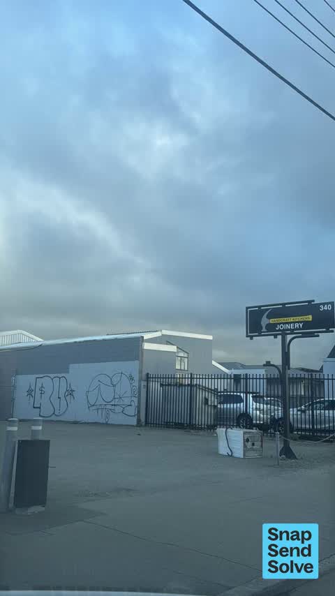 Graffiti on a fence, building or structure, a report photo