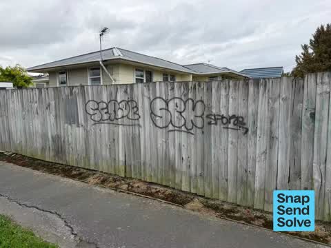 Graffiti on a fence, building or structure, a report photo