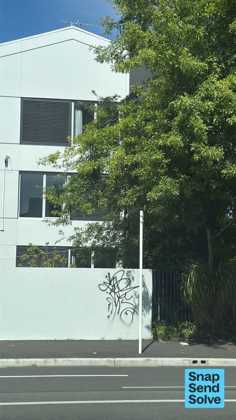 Graffiti on a fence, building or structure, a report photo