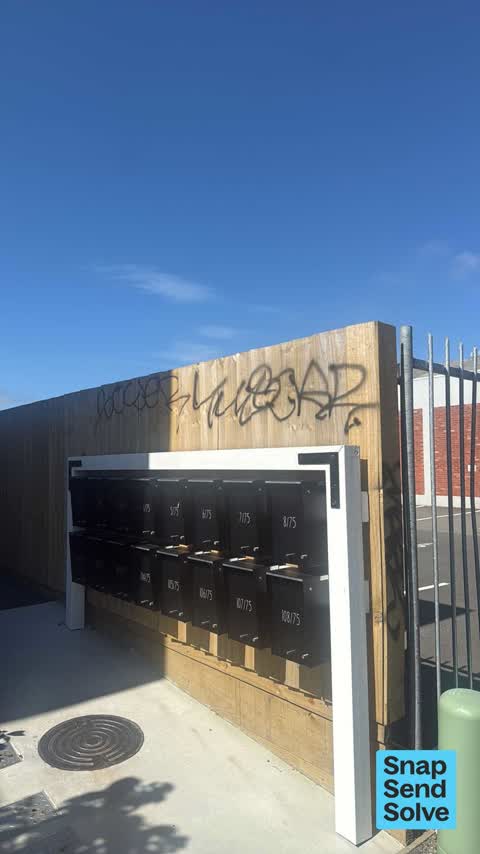 Graffiti on a fence, building or structure, a report photo