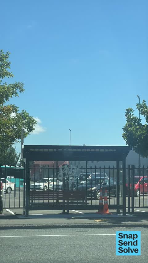 Graffiti on a bus stop or public toilet, a report photo