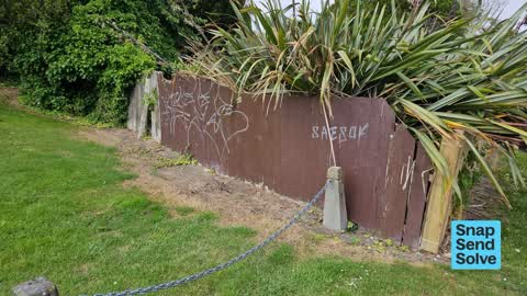 Graffiti on a fence, building or structure — a report photo