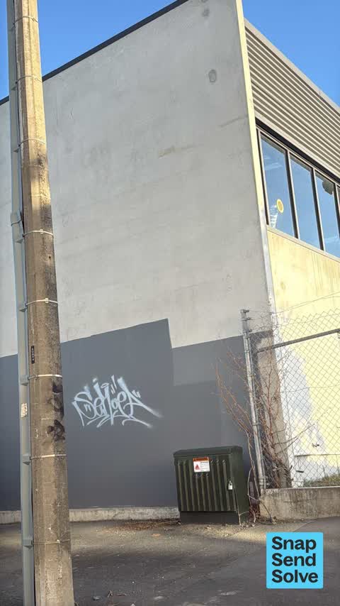 Graffiti on a fence, building or structure, a report photo