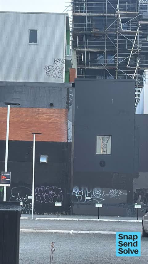 Graffiti on a fence, building or structure, a report photo