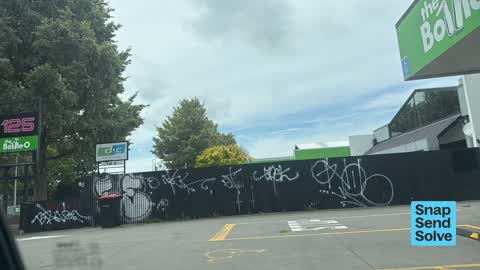 Graffiti on a fence, building or structure — a report photo