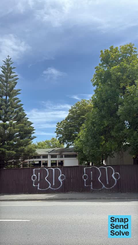 Graffiti on a fence, building or structure, a report photo
