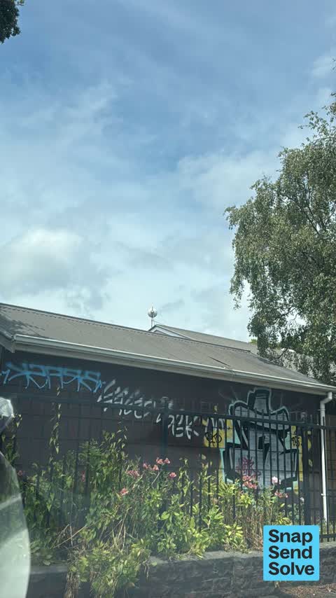 Graffiti on a fence, building or structure, a report photo