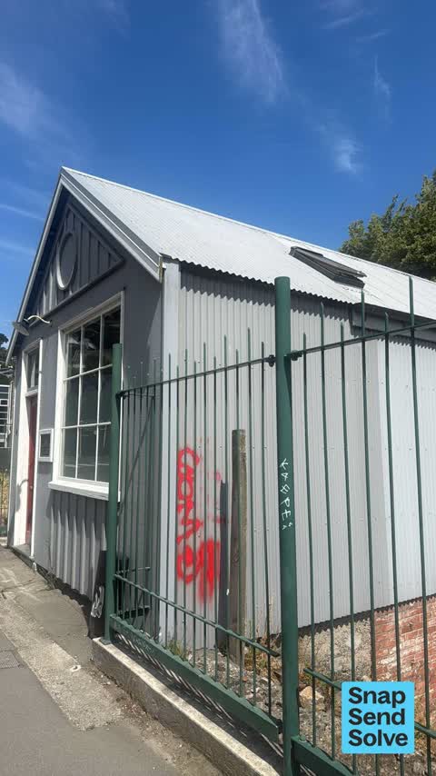 Graffiti on a fence, building or structure, a report photo