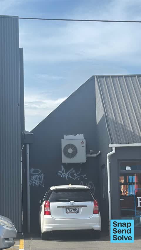 Graffiti on a fence, building or structure, a report photo