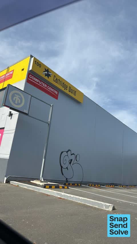 Graffiti on a fence, building or structure — a report photo