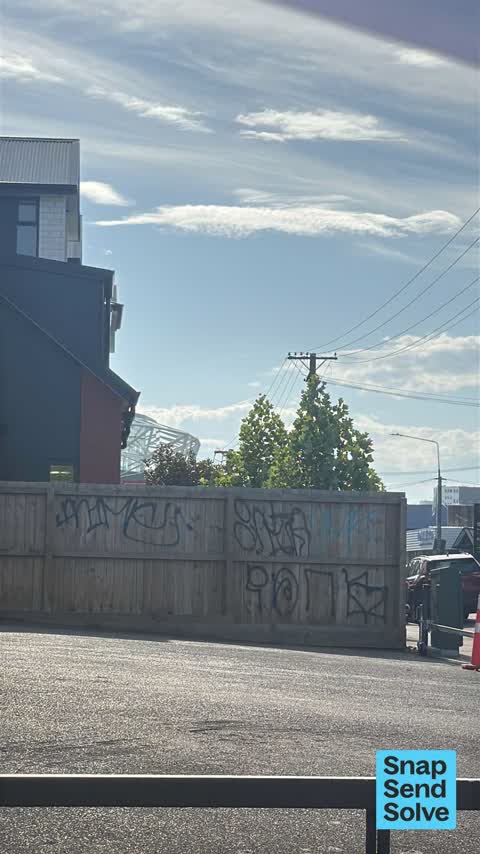 Graffiti on a fence, building or structure, a report photo