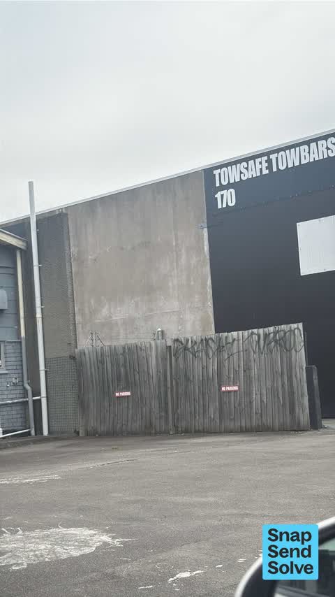 Graffiti on a fence, building or structure, a report photo