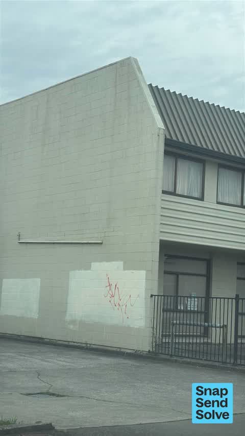 Graffiti on a fence, building or structure — a report photo