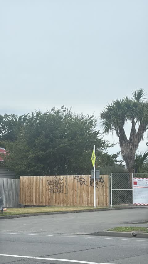 Graffiti on a fence, building or structure, a report photo