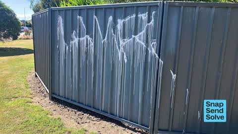 Graffiti on a fence, building or structure — a report photo