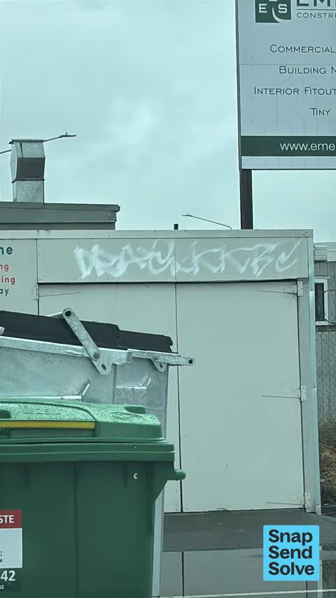 Graffiti on a fence, building or structure, a report photo
