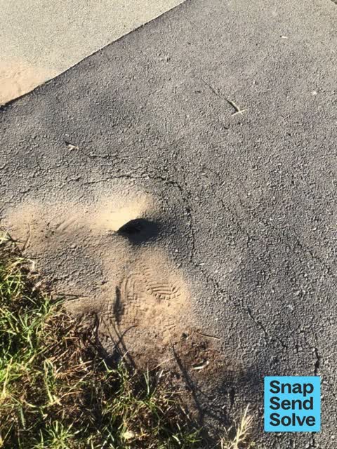 Pavement - Damaged, a report photo