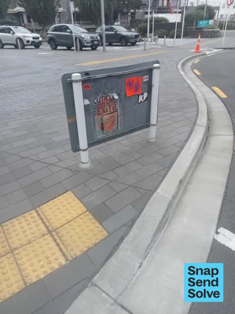 Graffiti on a sign, mural or public art, a report photo
