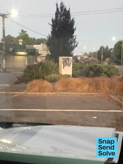 Graffiti on a fence, building or structure, a report photo