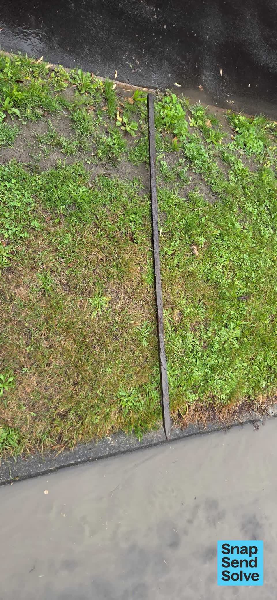 The photograph attached to this street gutters / storm water report