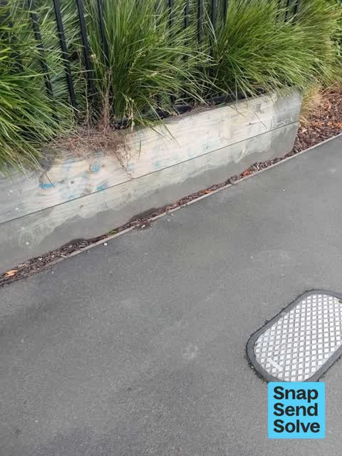 Graffiti on a fence, building or structure, a report photo