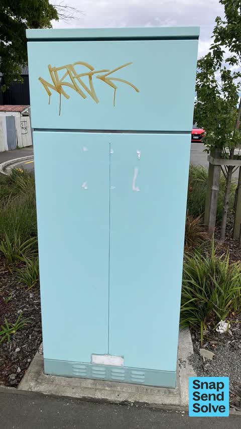 Graffiti on a traffic light pole or cabinet, or wa — a report photo