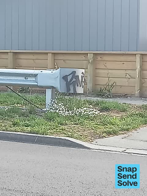 Graffiti on a fence, building or structure, a report photo