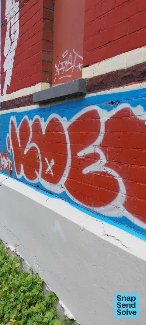 Graffiti on a fence, building or structure — a report photo