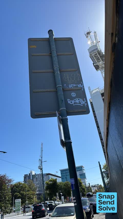 Graffiti on a sign, mural or public art, a report photo