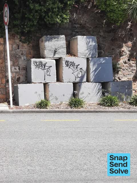 Graffiti on a road, footpath or bridge, a report photo