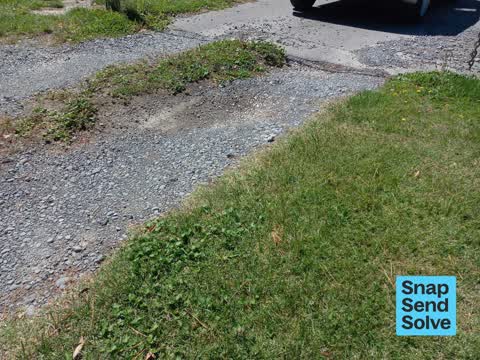 Pothole — a report photo