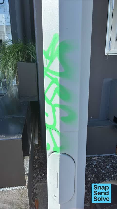 Graffiti on a traffic light pole or cabinet, or wa, a report photo
