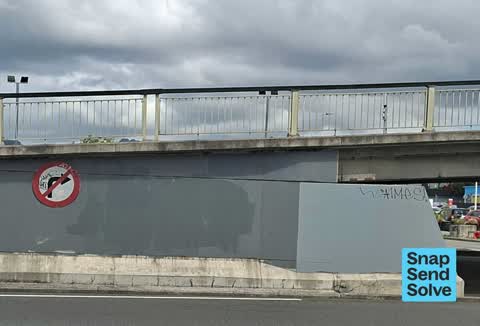 Graffiti on a sign, mural or public art, a report photo