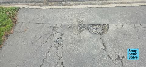 Pavement - Damaged, a report photo