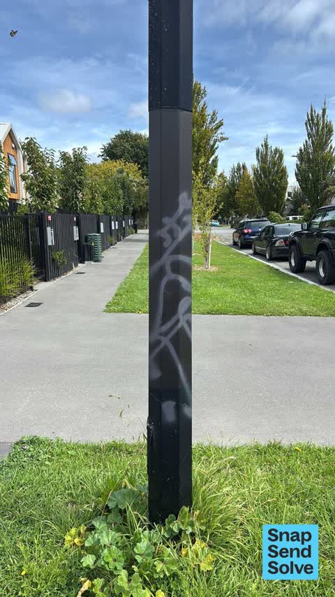 Graffiti on a traffic light pole or cabinet, or wa, a report photo