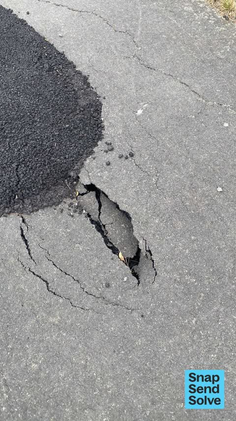 Pavement - Damaged, a report photo
