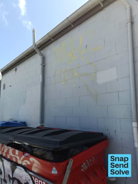 Graffiti on a fence, building or structure, a report photo