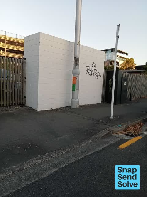 Graffiti on a fence, building or structure — a report photo