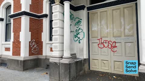 Graffiti on a fence, building or structure, a report photo
