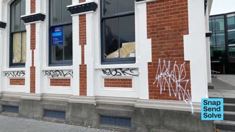 Graffiti on a fence, building or structure, a report photo