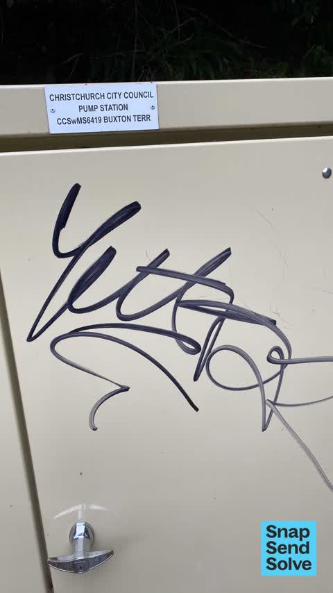 Graffiti on a traffic light pole or cabinet, or wa, a report photo