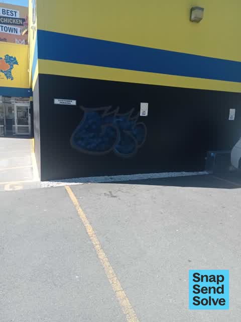 Graffiti on a fence, building or structure, a report photo