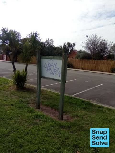 Graffiti on a sign, mural or public art, a report photo