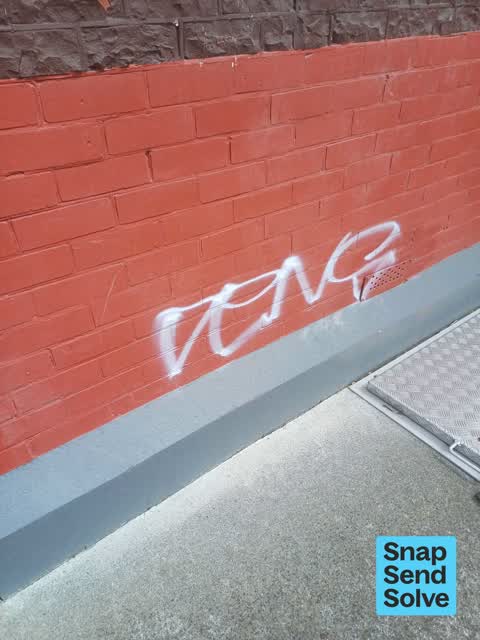 Graffiti on a fence, building or structure — a report photo