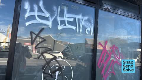 Graffiti on a fence, building or structure, a report photo